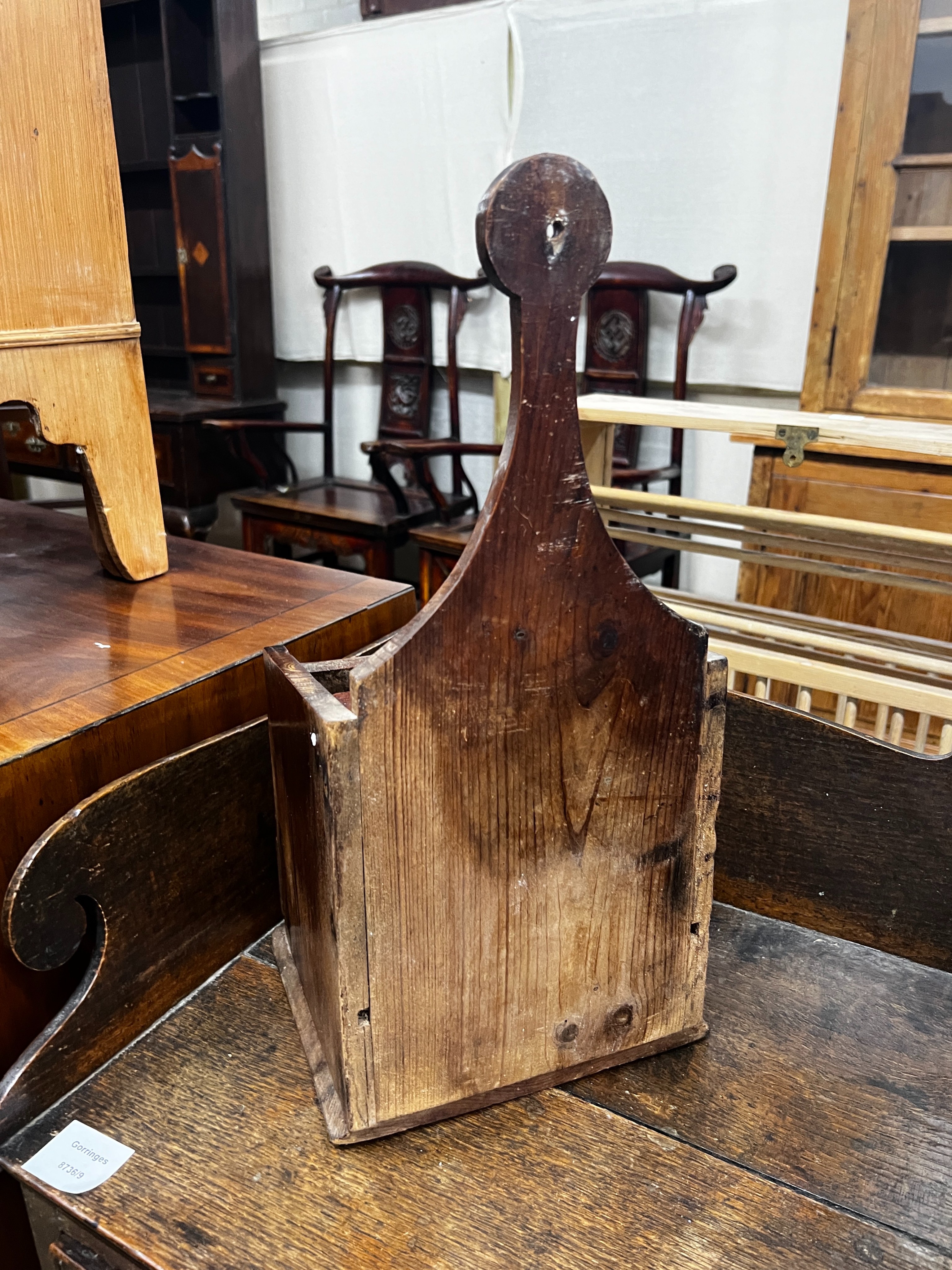 A 19th century yew wood hanging salt box, width 19cm, depth 17cm, height 43cm